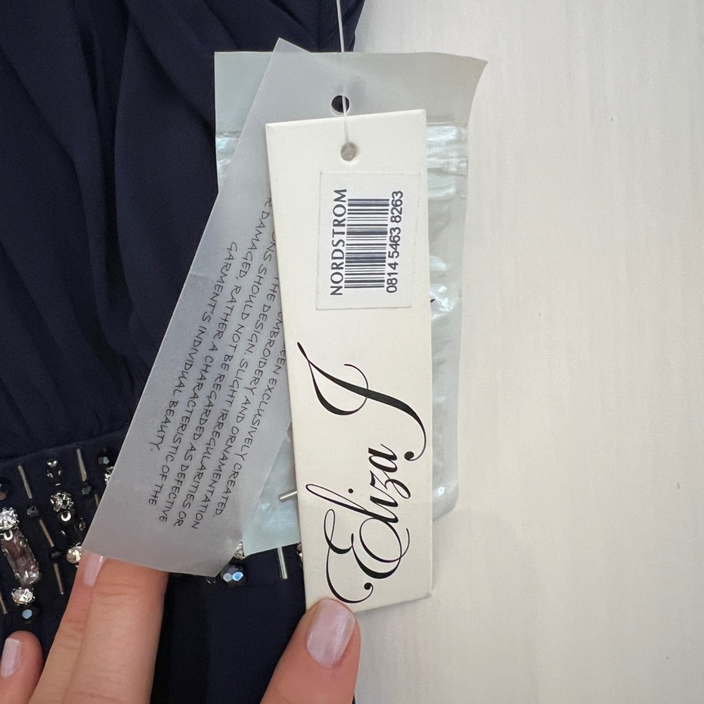 Eliza J formal dress size 4P, navy chiffon. Halter neck line with beaded details